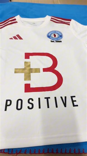 Banbridge Rangers 2014s – Proudly Wearing B Positive Tonight, the Banbridge Rangers 2014s were presented with their stunning new kits, proudly featuring the B Positive logo. The boys visited B Positive HQ to pick up their kits and to hear a little more about the work we do to support children and families affected by childhood cancer here in Northern Ireland. A huge thank you to their head coach, Stuart, whose commitment to B Positive has been unwavering from the very beginning. He has worked ti