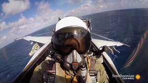 627K views · 10K reactions | Think you could land a fighter jet? How about landing one on a 300-foot runway?  To see how it’s done, watch this clip from Carriers at War: Ready to Launch. For more wild stories from the flight deck, follow Smithsonian Channel Aviation Nation. https://bit.ly/3pNech8 | Smithsonian Channel Aviation Nation | Facebook