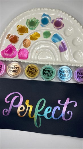 ✨ Explore the world of shimmering calligraphy using Perfect Pearls! 💫✒️ Transform your Perfect Pearls into watercolor with just a splash of water. Dive into the art of Watercolor Calligraphy with @sarahstyledesigns! Supplies: 🔹Ranger Perfect Pearls: Pink Gumball, Perfect Bronze, Perfect Gold, Zinnia, Blue Hydrangea, Iris Other: 🔹Watercolor Brush Size 6 🔹Black Paper 🔹Water Dropper 🔹Anything with wells to mix your perfect pearls and water Instructions: 1️⃣Add a tiny amount of Perfect Pearls 