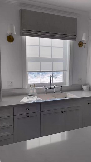 This new build gets custom drapery! The drapery on the French doors and Roman shade valances add texture and coziness. We added white roller shades to soften the harsh sunlight while enjoying the breakfast nook. Did you know Custom Drapery by Annie C also does banquette seating!? #banquetteseating #altexblinds #maxwellfabrics #motorizedblinds | Custom Drapery by Annie Cooper