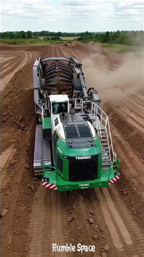 Watch This Monster Machine Destroy Piles of Earth!