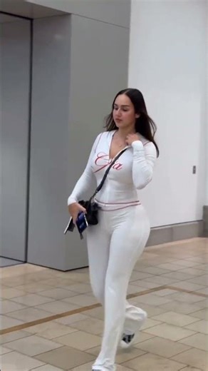 Bold White Athleisure: Red-Piped Sleek Tracksuit for Everyday Glam