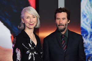 Keanu Reeves cozies up to Alexandra Grant in rare red carpet appearance