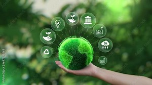 Ecology icon concept. ESG environment, society and governance. Saving the green planet in the hands of humans on green background. Stock Video