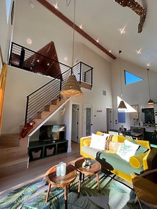 Could you live in this 650-sqft jungle-themed "treehouse" built on stilts with an incredible outdoor living setup? What would you change or add? You can watch the full video tour here 🙂 https://youtu.be/BvG5Sol9qVk Inside, this small home features a spacious floor plan with a living room, a kitchen with full-size appliances, a main-floor bedroom with a full-size closet, a beautiful bathroom with a tile shower & soaking tub, as well as an additional loft space that serves as a guest bedroom or a