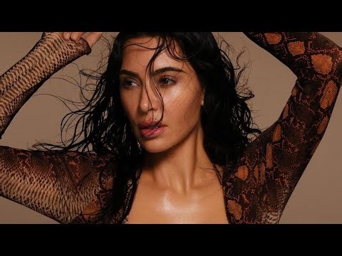 Kim Kardashian Stuns in Sleek Sheer SKIMS Bodysuit | Bold Fashion Moment