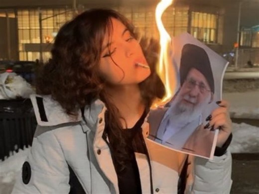 After 'bloody' protest, viral photos show Iranian women using Khamenei’s photos to light cigarettes. Here's why