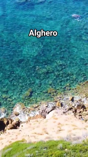 Alghero shore from above 🌊🇮🇹 #Alghero #Sardinia #DroneShots #TravelShorts #Italy #shorts