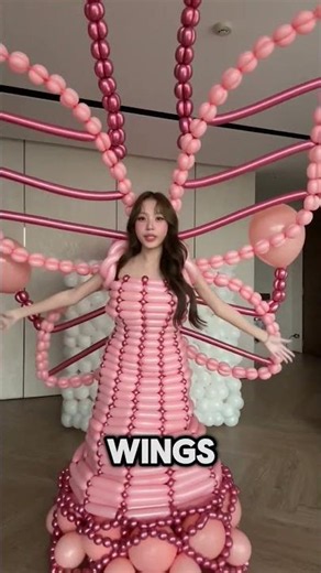 She made a balloon dress that looked like an angel