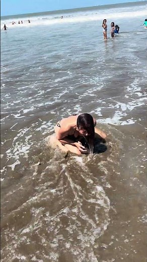 Woman Gets Swept Away by Waves - 1635348
