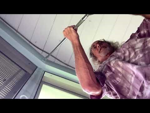 How to open and close roll up crank hurricane shutters