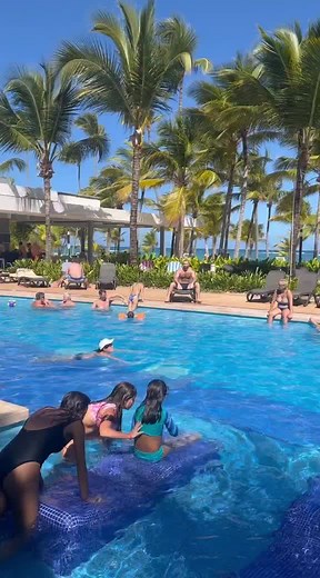 Poolside Dive Fun: Man Takes the Plunge