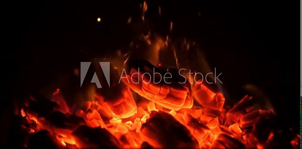 Burning coal embers fire pit barbecue grill hot glowing heat energy close up stock footage video