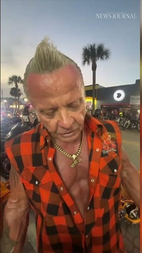 Biker shows off motorcycle at Daytona Bike Week