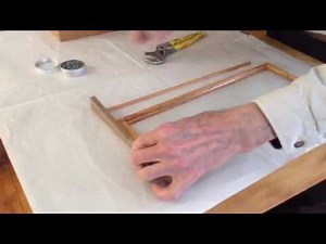 Woodworking - attaching retainer strips on a glass door