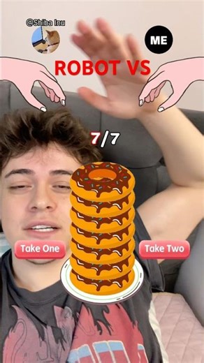 We're playing a game against a robot; the last one to grab the cookie wins.