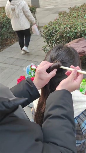 New Year's Chic: Gentle Bun with Coiled Black Hair