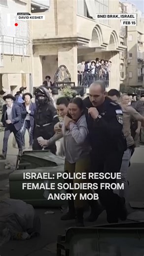 #FPReels: Israel: Police Rescue Female Soldiers From Angry Crowd In Bnei Brak Israeli police rescued two female soldiers after they were surrounded by an angry crowd in the ultra-Orthodox city of Bnei Brak. Footage shows officers escorting the soldiers away as protesters shouted and followed them through the streets. Officers pushed through protesters, formed a shield, and escorted the soldiers to safety. Clashes broke out in the ultra-orthodox city as protests erupted over Israel’s mandatory mi