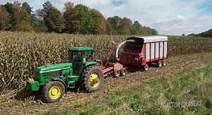 Tractor Chasers -- Watch this John Deere 4960 make fast work of chopping corn silage on this dairy farm. Using a Gehl forage harvester and wagons to move the silage back to the bagger.