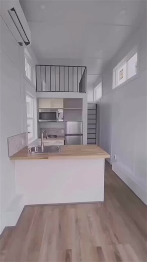 84.Forrester Model 😍This luxurious 22ft tiny home, comes with a carpeted bedroom loft addition, accessible with an iron pullout ladder, as well as guarded with a custom welded black iron ra