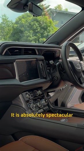 Right Hand Drive GMC Yukon Denali Ultimate — Alpine Umber Luxury ⚙️ Step inside the Yukon Denali Ultimate and discover an interior designed for the highest levels of sophistication and comfort. The exclusive Alpine Umber trim features hand-stitched leather with intricate cross-stitching and a laser-etched map of Mount Denali in the wood accents. Premium touches include a Bose Performance Series sound system with speakers built directly into the headrests, advanced driver technology, and a cabin 