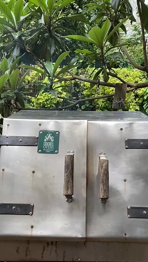 Kuku Choma Cooking with Cookswell Charcoal Oven