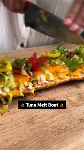 Mark our words: tuna melts are popular again thanks to this A Open Faced Tuna Melt Boat recipe! 🥪🚢 Get the full recipe below or through the link in @allrecipes bio. 🧡 Ingredients: 2 (10-ounce) cans tuna, drained 1/4 cup finely chopped red onion 1/4 cup finely chopped pickles 1 stalk celery, finely chopped 1/2 cup mayonnaise, plus more to taste 2 teaspoons fresh lemon juice 1/2 teaspoon lemon pepper salt and freshly ground black pepper to taste 1 loaf French bread, halved lengthwise 8 ounces C