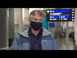 Rod Phillips speaks to the media after returning home from controversial vacation