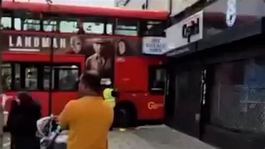 London bus filled with passengers crashes into shop