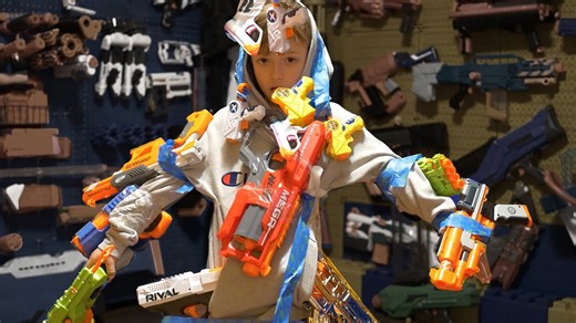 How many Nerf guns can you fit on one kid? The ultimate Nerf challenge!