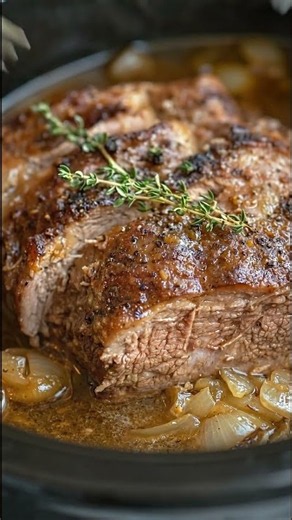 Slow Cooker Garlic Herb Pot Roast with Onion Gravy
