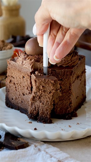 This Chocolate Cheesecake is incredibly rich and creamy. Chocolate crust, with a decadent chocolate filling, topped with a silky chocolate ganache, and chocolate whipped cream. 🤎 Check out this amazing recipe here: https://www.piesandtacos.com/chocolate-cheesecake/ | Pies and Tacos