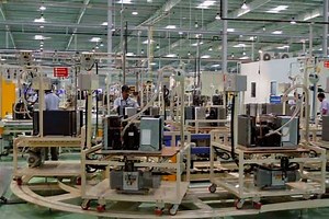 India's factory output rises to 14-month high in February