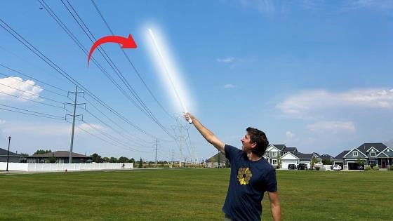 Can power lines really light a bulb in your hand?
