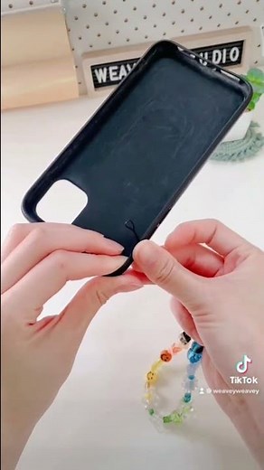How to attach a phone charm to my phone case