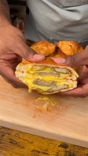 Simba M. on Instagram: "Breakfast uncrustable recipe ⬇️ 8 large canned biscuits 8 slices of American cheese (or whatever you prefer) 6-7 eggs 1/2 tbsp unsalted butter Salt & pepper to taste 8 breakfast sausages (I used turkey) Hash brown bites (I added about 3 per pocket) Freezer instructions: Place each pocket (unbaked) on a small piece of parchment paper and freeze these individually in small freezer ziplock bags. When you’re ready to heat, bake on oven safe pan at 350 degrees for 18-22 minute