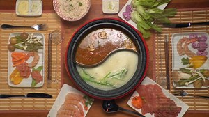 Have you heard of the Electric Hot Pot? It's a dual-sided fondue pot in which you can put 2 types of broth, or use one side for broth and the other for grilling! https://www.starfrit.com/en/dual-sided-electric-hot-pot | Starfrit | Facebook