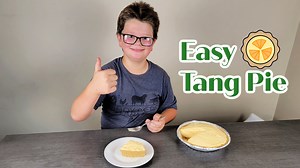 Tang powder mixes with cream cheese, condensed milk, and whipped topping to make this super silky no bake pie. It is cool and creamy with citrus from the tang and a bit of vanilla from the condensed milk, so it almost tastes like a dreamsicle in pie form. Printable Recipe: https://cookingwithcarlee.com/tang-pie/ | Cooking With Carlee