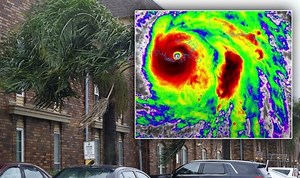 Reporter battered by Hurricane Ida live on air