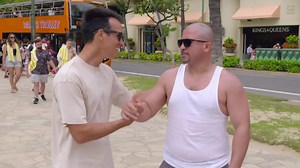 Man battling addiction finds new purpose by teaching strangers to surf on Waikiki Beach
