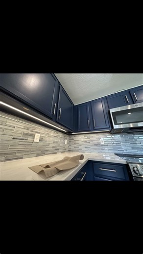 Blue Kitchen Cabinets With LED Lighting Underneath #CoeurdAlene #electrician #kitchen