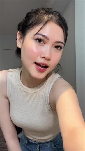 Person Performing Expressive Hand Gestures in Simple Setting