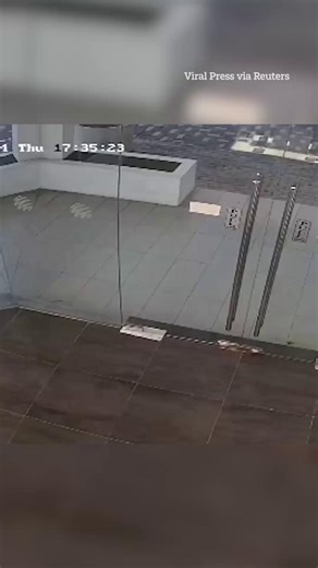 Eerie moment glass door mysteriously opens and shatters on impact | The Sun