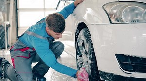 Man washing car on a car wash Stock Video
