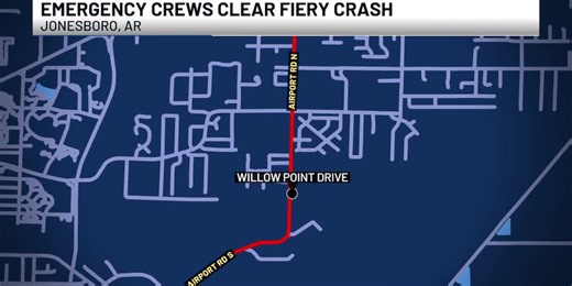 Fiery crash blocks traffic on Airport Road