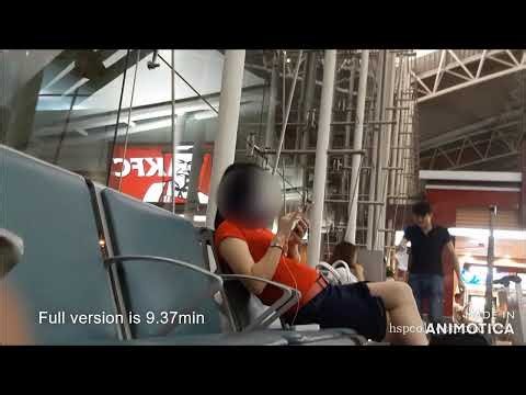 Chinese MILF at the arrival hall...