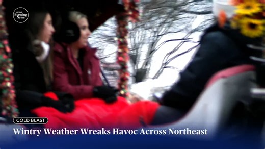 Snow, ice and freezing rain is bearing down on parts of the Northeast causing dangerous and slippery road conditions and power outages. | CBS Evening News