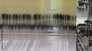 Weaving loom industrial textile production at work