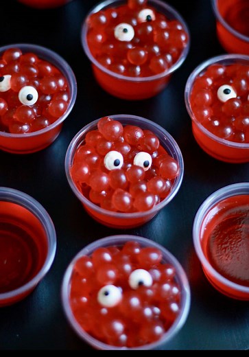 Send to someone who loves Halloween. Halloween Jell-O Shots Simply make Jell-O according to package instructions. To make into a shot version, sub vodka for water. Allow Jell-O to set up. Add boba, candy eyes and Halloween candy. Follow me @thechicishchick for all things Halloween, fall party ideas, tablescapes and recipes! #halloweenrecipe #halloweendrinks #halloweencocktails