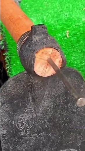 This is the process of installing a handle used for a hoe